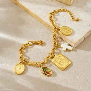 Gold-plated chain bracelet with Virgin Mary medallions and elegant cross charms