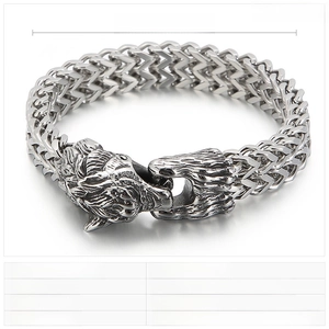 Detail view of steel wolf head buckle on a 12mm double-row stainless steel chain bracelet