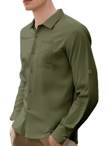 Close-up of military green linen shirt texture with chest pocket and cuff detail