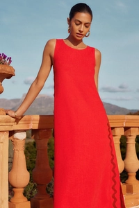 Close-up of wavy lace trim details on a red sleeveless cotton linen maxi dress
