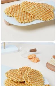Detailed macro view of golden waffle biscuits with grid texture and wavy edges