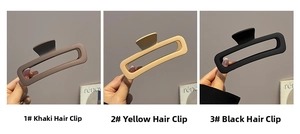 Three rectangular matte hair claws in khaki, yellow, and black colors for large hair volume