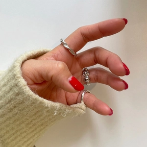 Set of three minimalist 925 sterling silver rings with smiley face and twist texture