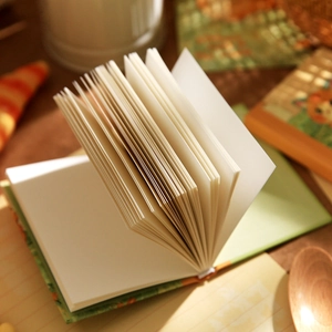 A7 portable notebook with original illustration cover and blank pages for journaling