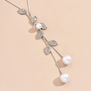 Elegant long geometric sweater chain with rhinestone leaves and white pearls