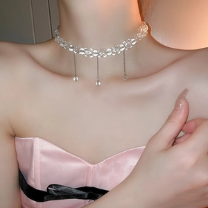Double-layered transparent glass bead choker with shimmering metallic tassels for women