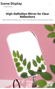 Pink desktop makeup mirror with storage tray base and rotating rectangular HD glass