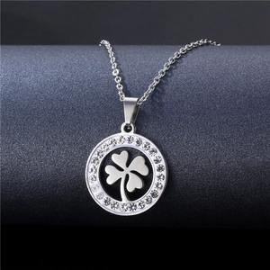 Close-up of geometric hollow clover necklace with sparkling cubic zirconia inlay