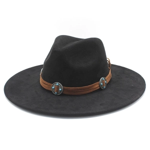 Detail of western fedora hat featuring brown leather band with silver conchos and turquoise