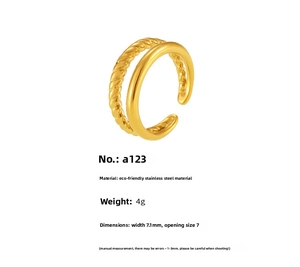 Detail of double-layer twisted gold-plated stainless steel ring showing 7.1mm width