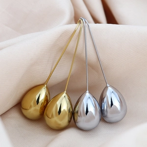 Elegant gold and silver water-drop pendants on silk, minimalist stainless steel jewelry