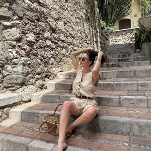 Women's beige linen blend vest and shorts set for casual summer vacation wear