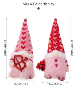 Size display of knitted Valentine's Gnomes holding heart arrow and red roses