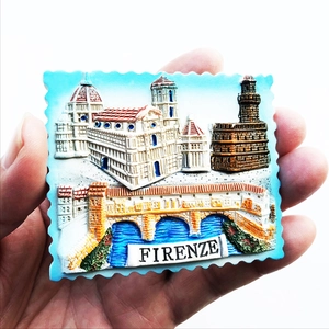Detail showing hand-held 3D resin Florence fridge magnet with Duomo and Ponte Vecchio
