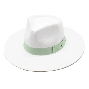 Detailed close-up of white wool fedora hat with light green grosgrain ribbon trim