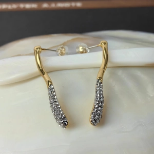 Irregular geometric drop earrings with 18k gold plating and micro-pave crystals