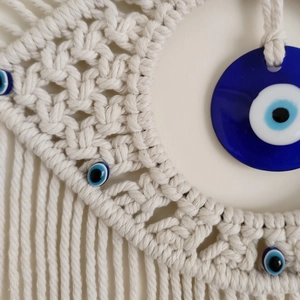 Bohemian handmade woven macrame wall hanging with blue evil eye decor for home art