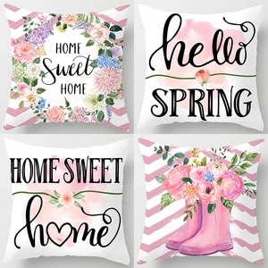 Set of four floral peach skin pillow covers featuring watercolor spring flower designs