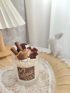 Detailed view of strawberry chocolate dessert scented candle with a thank you label