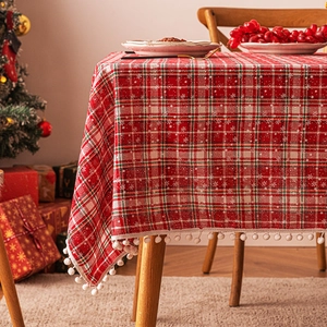 Christmas red plaid tablecloth with white pompom fringe for festive dining decor