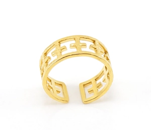 Detail of gold-plated stainless steel hollow ring with cross texture pattern