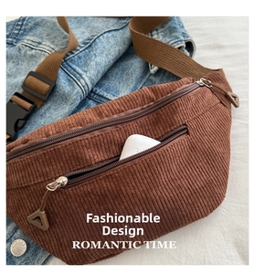 Close-up of brown corduroy crossbody bag with adjustable strap and zipper detail