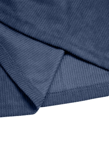 Detailed close-up showing the stitching and texture of dark blue corduroy fabric