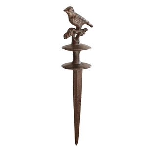 Vintage rust brown cast iron bird garden stake for outdoor decorative lawn ornament