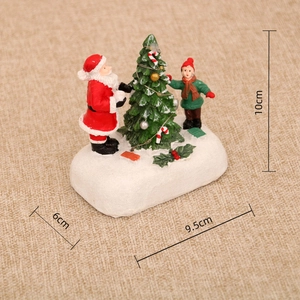 Détail de la figurine de Noël en résine avec dimensions de 10x9,5x6cm indiquées