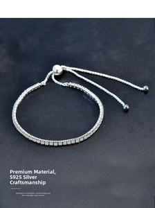 Detailed macro view of S925 sterling silver tennis bracelet with adjustable pull chain