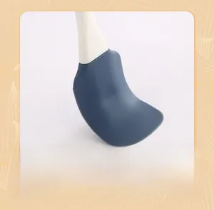 Close-up of flexible navy blue silicone spatula head showing durability and fast resilience