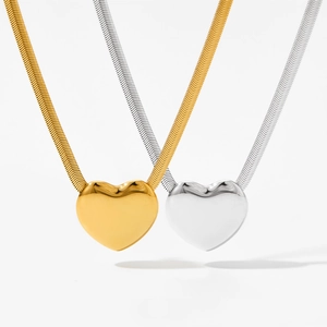 Minimalist hollow heart pendant necklaces in gold and silver with sleek snake chains