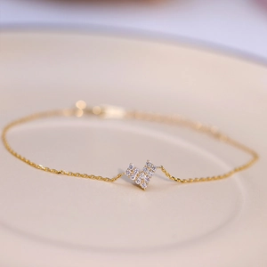 Exquisite S925 sterling silver gold plated bracelet with sparkling V-shaped zircon pendant