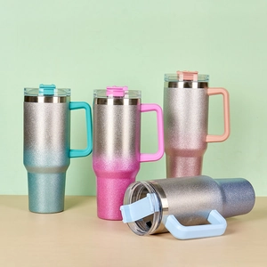 Group of 40oz stainless steel tumblers with glitter gradient colors and handles