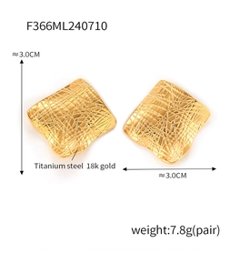 Macro shot of 18k gold plated titanium steel square earrings with irregular mesh texture