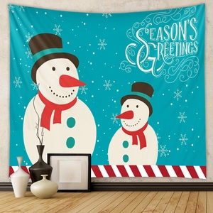 Detail view of Bohemian Christmas tapestry featuring two snowmen and festive greetings