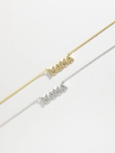 Detail of MAMA letter pendants in gold and silver finish with pave-set zircons
