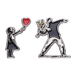 Retro artistic enamel pins featuring iconic heart balloon and flower thrower designs