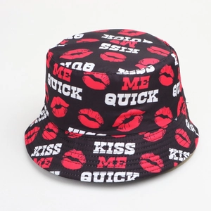 Detail of Kiss Me Quick lip print bucket hat with durable black twill fabric texture