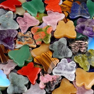 Carved crystal and agate butterfly ornaments in various natural stones for home decor