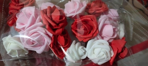 Close-up of colorful foam rose string lights in packaging for Valentine decoration