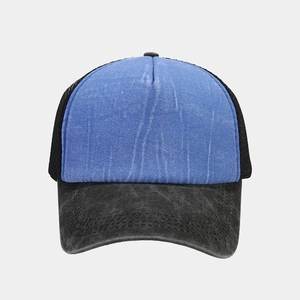 Classic blue washed denim trucker hat with black breathable mesh and curved visor