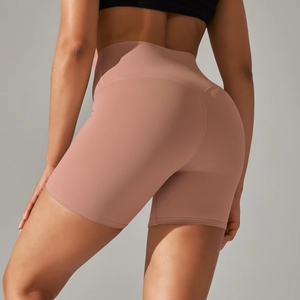 Close-up of high-waist fitness shorts featuring V-waist structure and scrunch butt detail