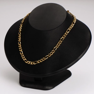 5.5mm golden stainless steel 3:1 twist curb chain necklace on black mannequin display