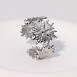 Minimalist silver sunflower ring in stainless steel with an adjustable open design
