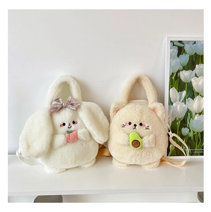 Detail of plush crossbody bags featuring bunny with peach and cat with avocado designs