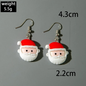 Boucles d'oreilles Père Noël en résine de 5,5g et dimensions 4,3cm x 2,2cm sur fond gris