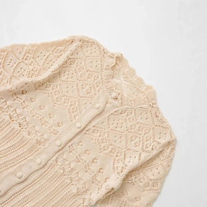 Beige hollow crochet knit cardigan featuring a round neck and delicate diamond mesh patterns