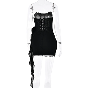 Detail of black strapless mesh dress featuring waist ties and side 3D floral accent
