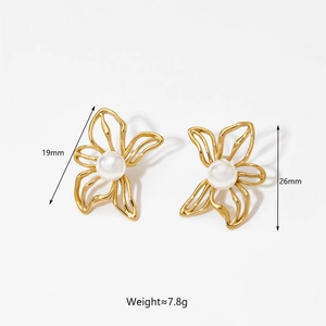 Detailed view of golden flower earrings with pearls including dimensions 19mm and 26mm